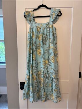 August sky light blue floral ruffle dress. Small